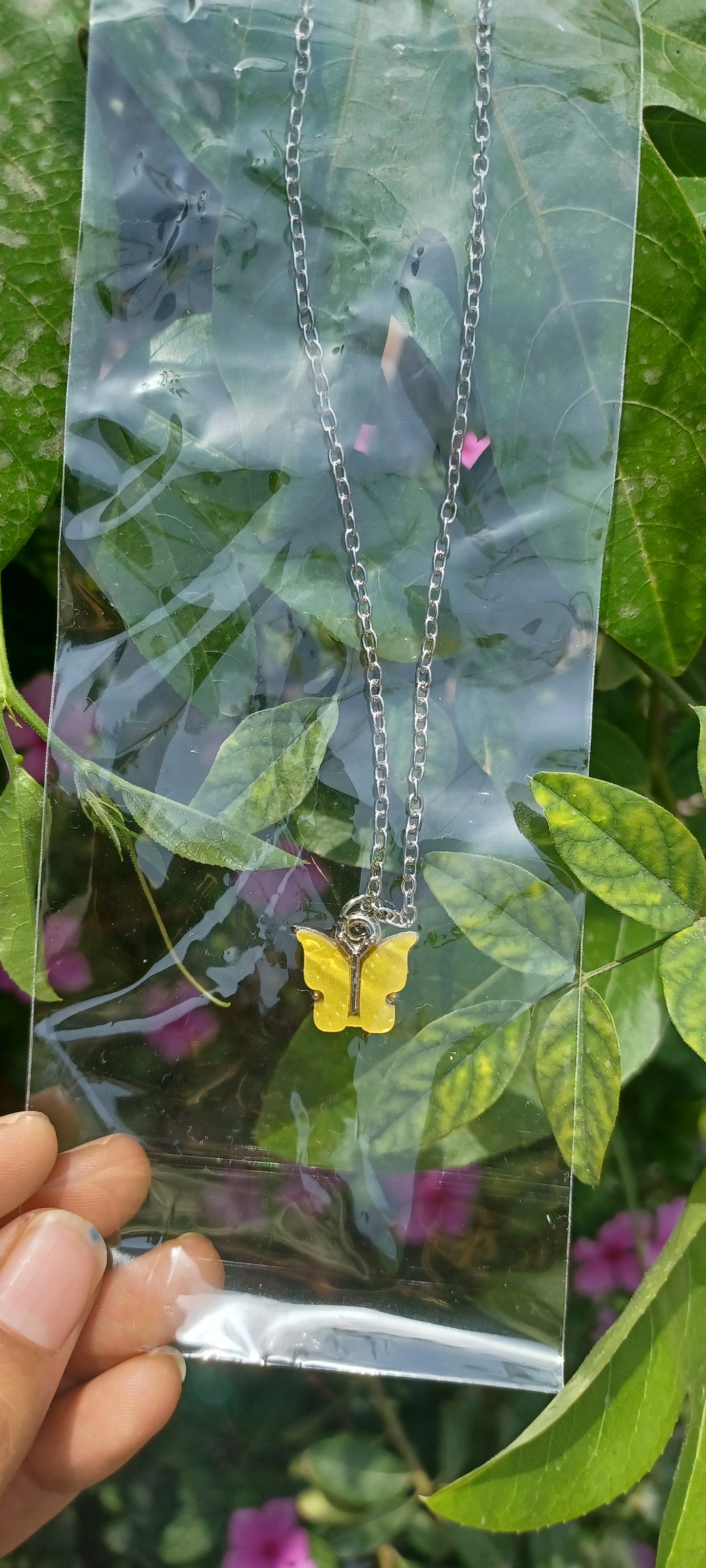 Minimal butterfly Neckchains.