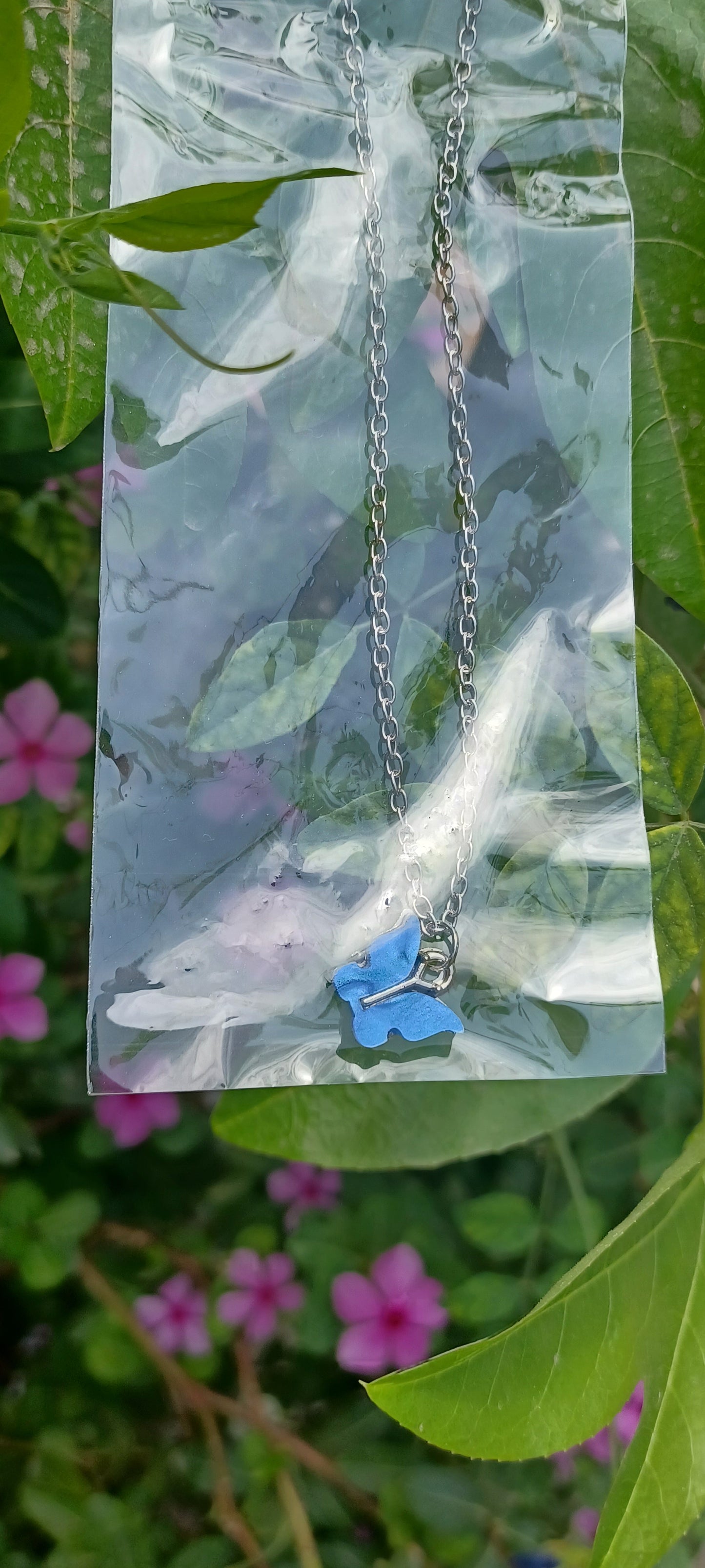 Minimal butterfly Neckchains.