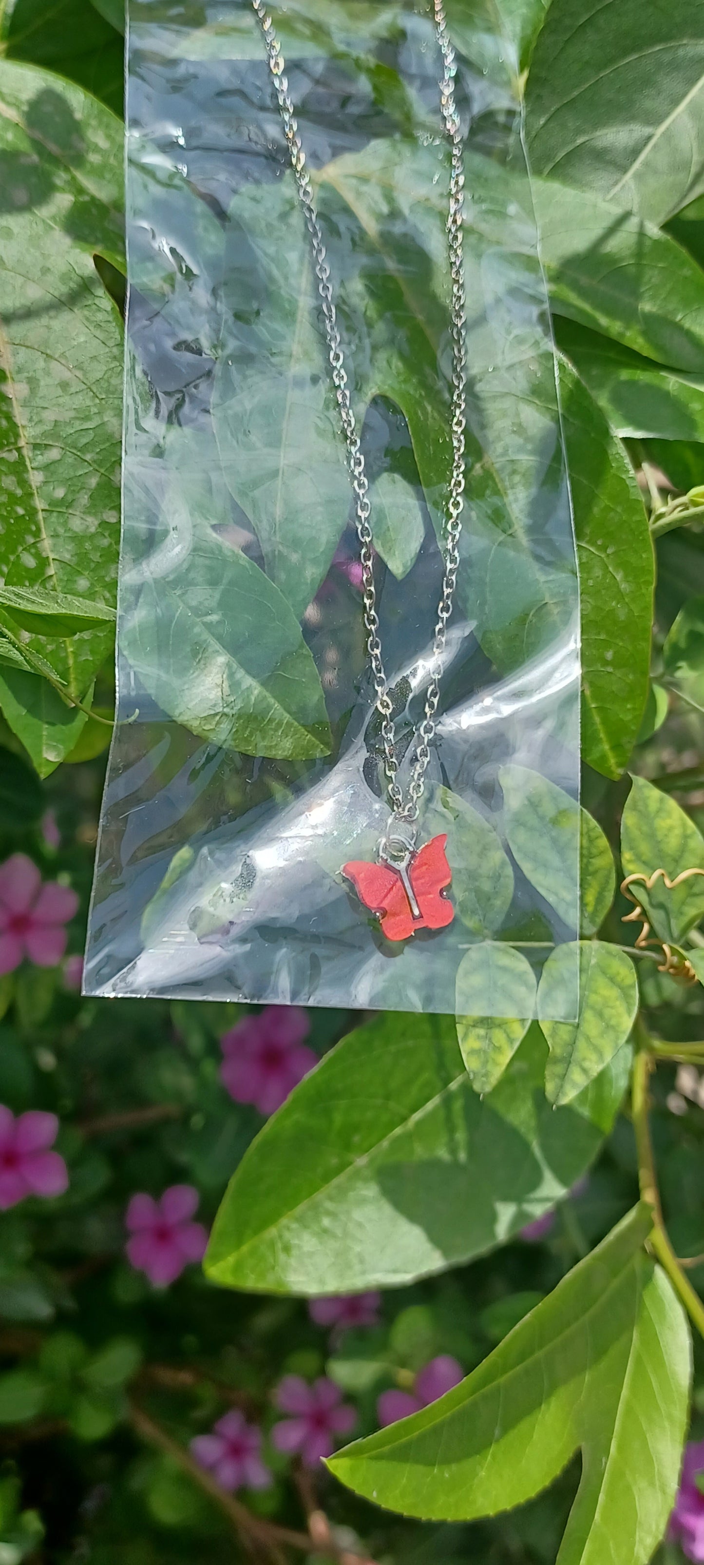 Minimal butterfly Neckchains.