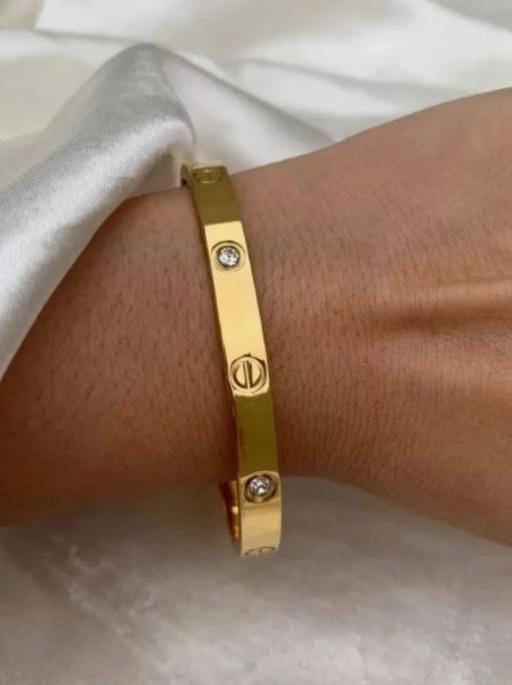 Crafted with precision engineering, our Golden Hand bangles offers exceptional durability